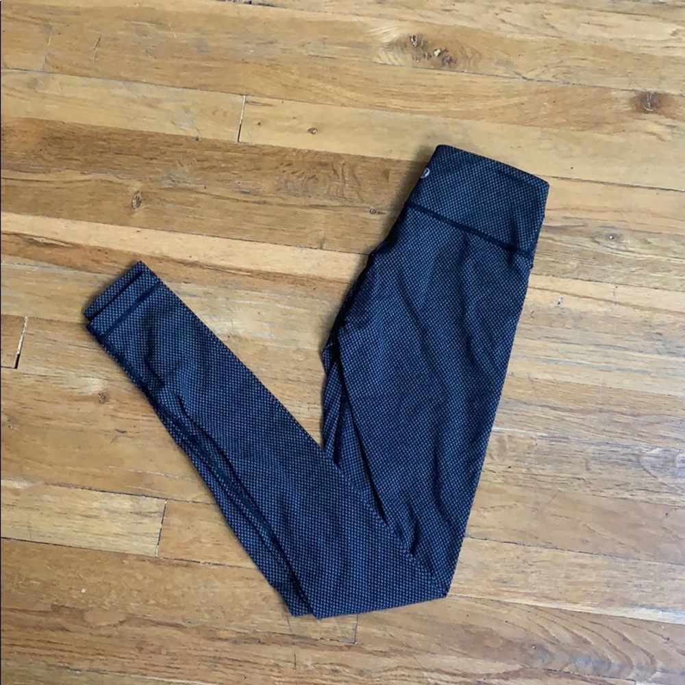 Black lulu lemon leggings with dots